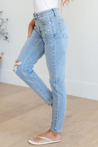 Mid rise control top distressed skinny jeans side profile